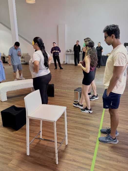 Students taking part in a partnering exercise