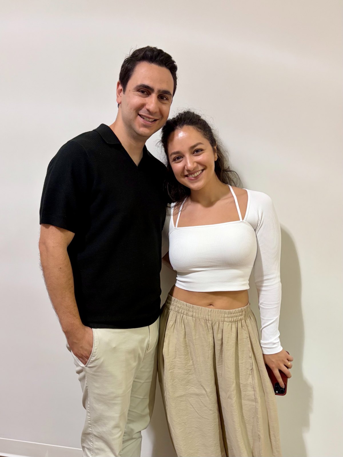 A couple smiling together at the studio
