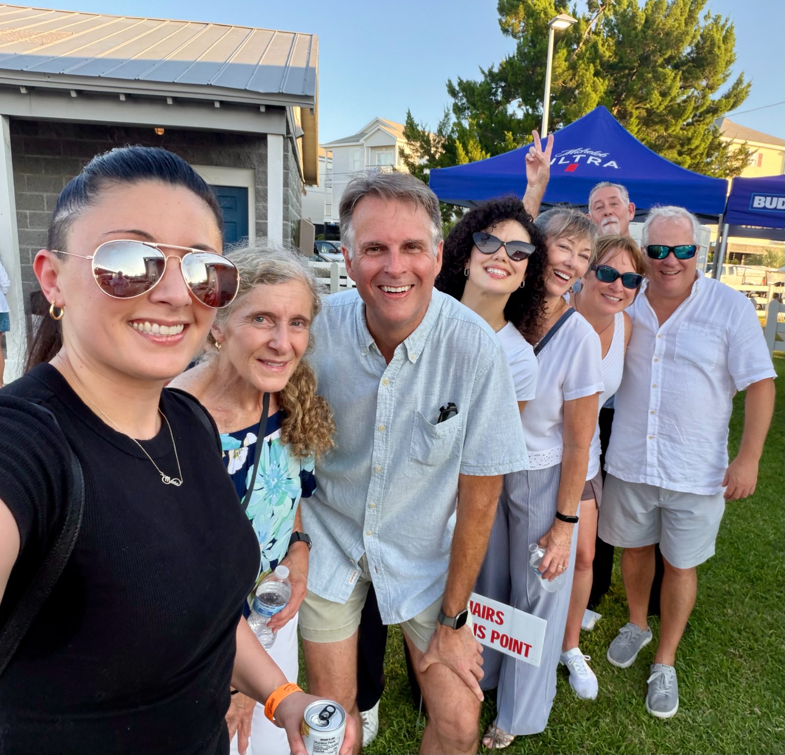 Students and instructors together at a community event